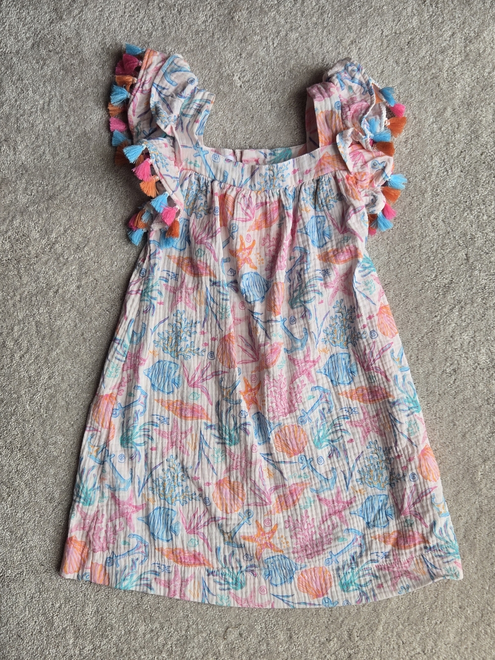 Mud Pie Girls' Seashell Print Dress with Colorful Tassels